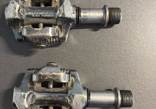 Exustar 215+ SPD pedaler.