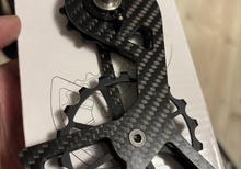 Kolfiber cage med keramiska lager till Shimano 105